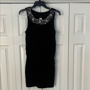 B. Smart Black Mini Dress with Embellished Neckline